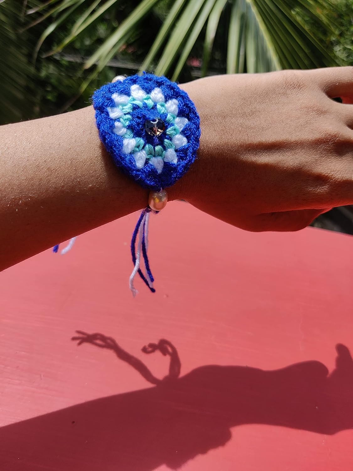 Kids multicolor evil eye, car and teddy rakhi set of 3 crochet rakhi bhaiya bhabhi rakhi gift set for rakhsha bandhan combo set with packed in fabric pouch with roli kumkum and chawal. Color may vary - Image 5