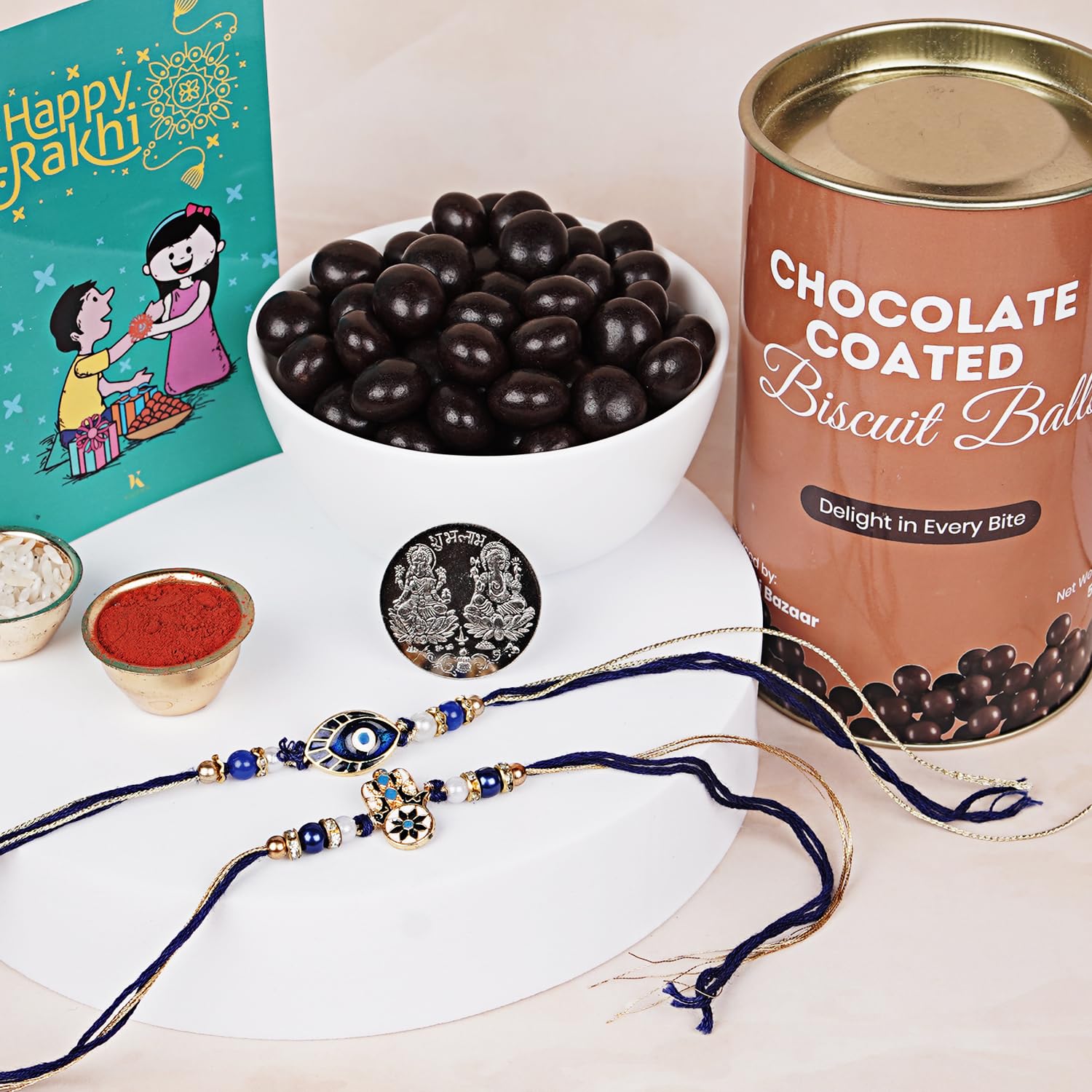 Kaameri Bazaar Rakhi for Brother combo with chocolate - Set of 2 Rakhi with 50 g Chocolate Biscuit Balls Gift Pack Greeting Card and Roli Chawal - Rakhi Gift for Brother - Evil eye and hamsa rakhi. - Image 2