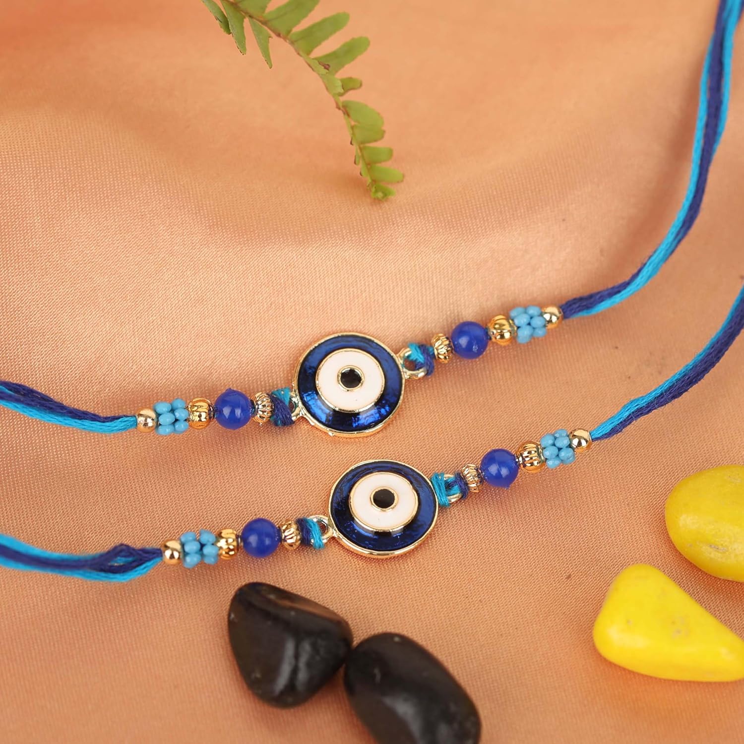 Riddhika Ventures Evil Eye Rakhi Protect From Negative Energy and ill intentions (Set of 2) with Roli Chawal, Greeting Card and and One Motivational Keychain (K18K19K) - Image 6