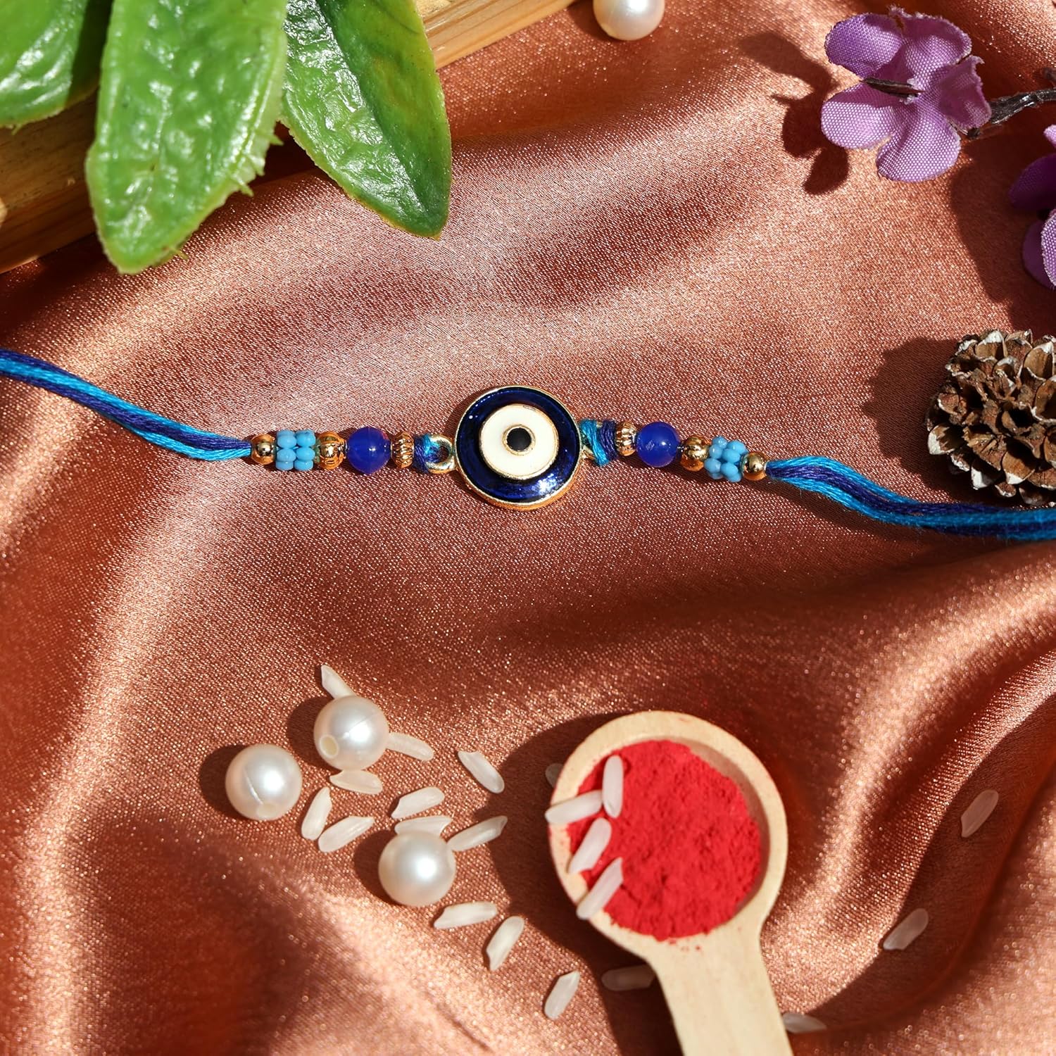 Riddhika Ventures Evil Eye Rakhi Protect From Negative Energy and ill intentions (Set of 2) with Roli Chawal, Greeting Card and and One Motivational Keychain (K18K19K) - Image 9