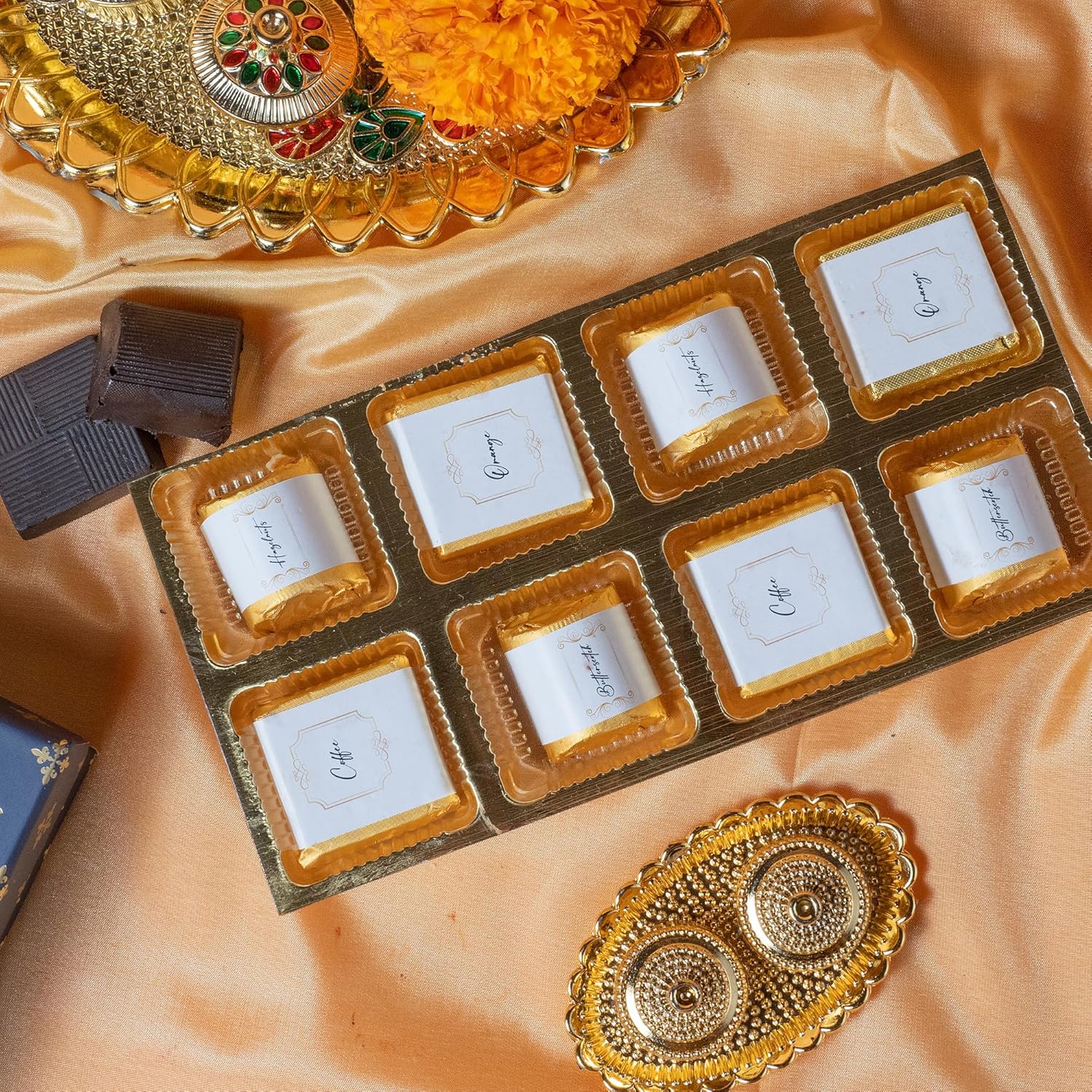 Oriole Gifts Rakhi Hamper for Brother with Premium Evil Eye Rakhi, Chocolate Bites, Almond Brittles, Coffee Almond Nutties, Paan Shots, Snacks & Greeting Card | Rakshabandhan Gift for Brother with Chocolate Gift Box - Image 8