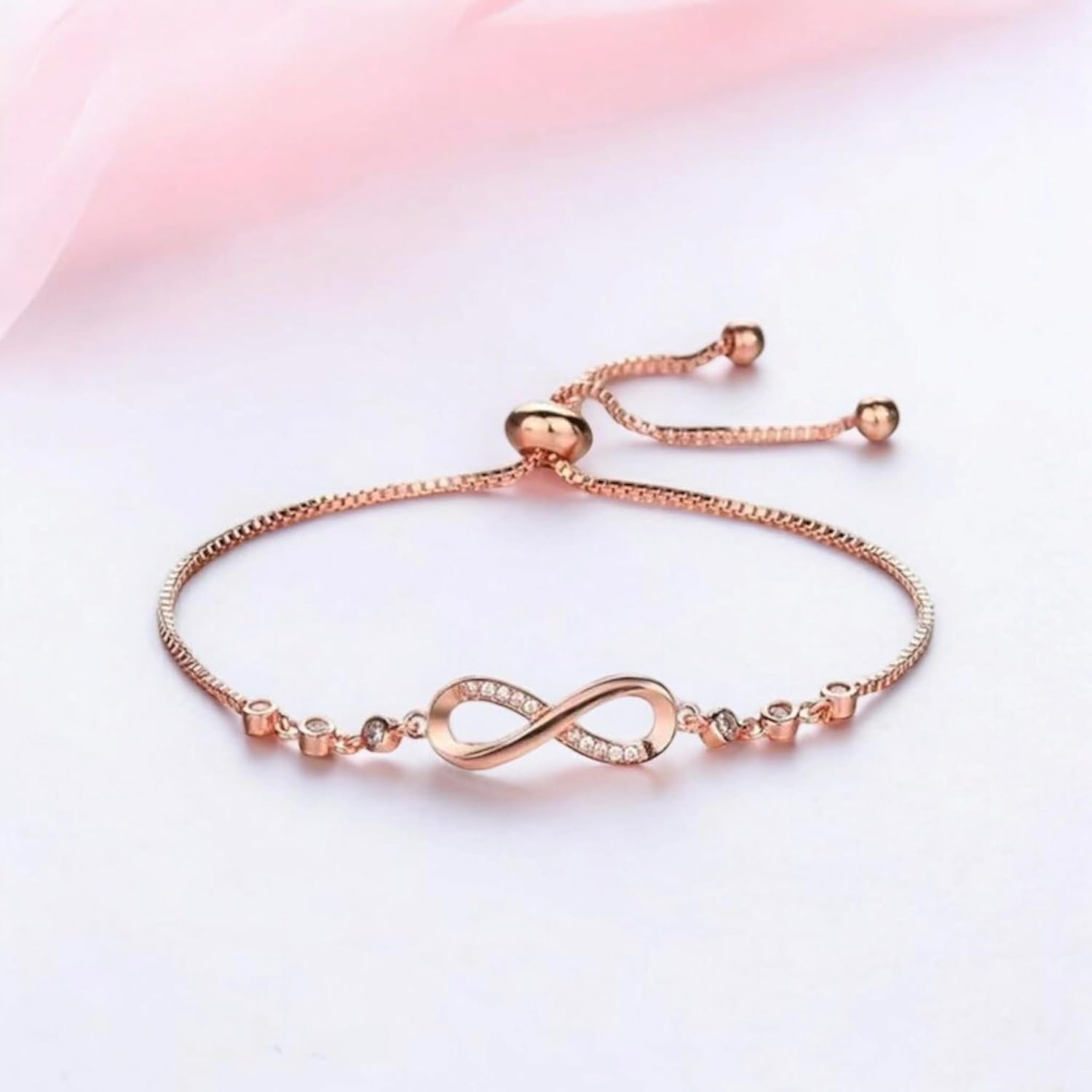 Nilu's Collection Infinity Shape Cubic Zirconia Diamond Bracelet for Women & Girls, Jewelry for Gift, Adjustable Charm Bracelet - Image 4