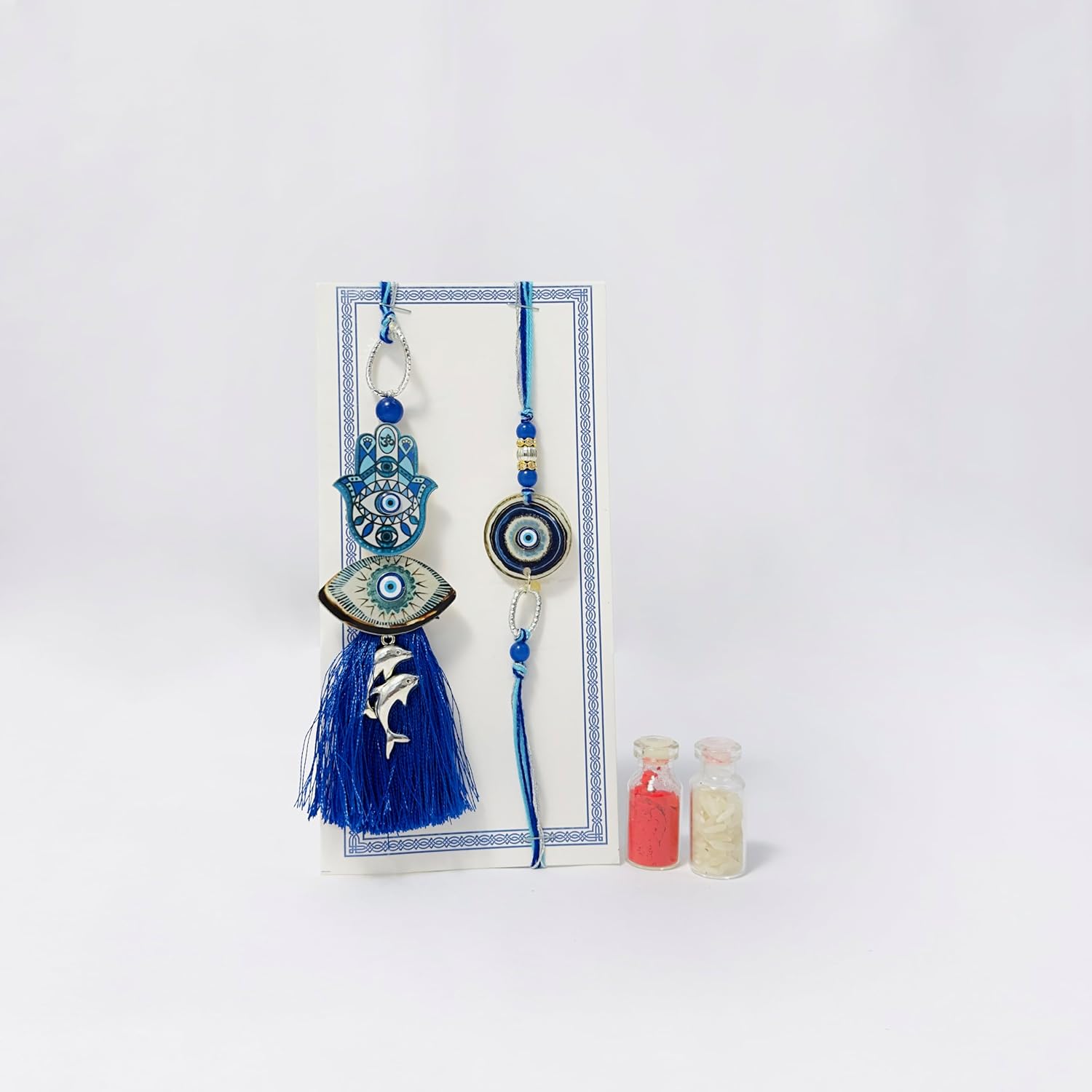 Yolo Roots 6 - Item Rakhi Gift Hamper For Bhayia and Bhabhi - Evil Eye Rakhi & Eval Eye Bracelet & Game Card, Date Bites & Roased Multigrain Namkeen - Image 5