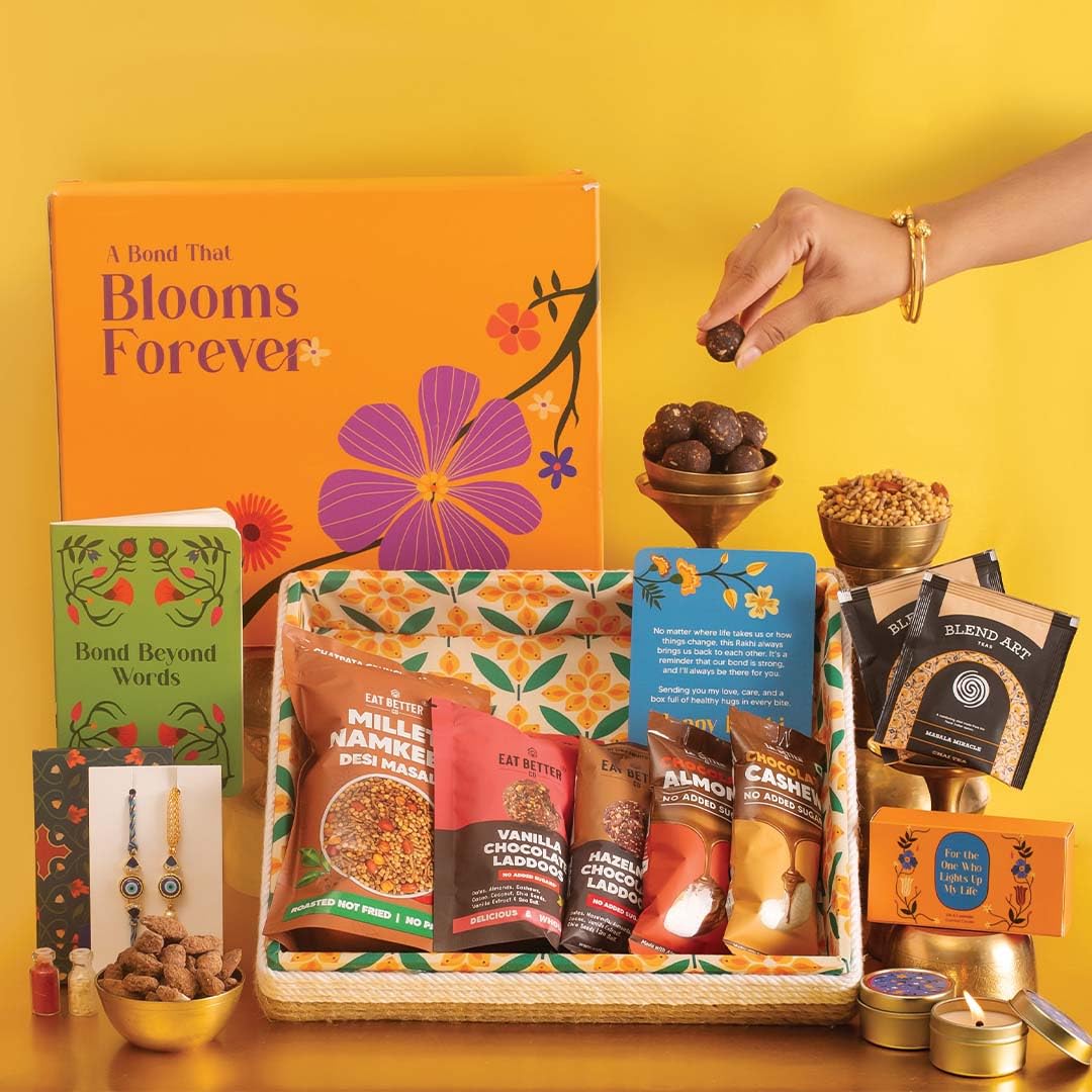 14- Item Jute Tray Rakhi Gift for Bhaiya Bhabhi – Sustainable Gift Hamper with Evil-Eye Rakhi & Bracelet – Dry-Fruit Chocolate Laddoos, Chocolate Coated Nuts, Scented Candles & Planner & more - Image 2