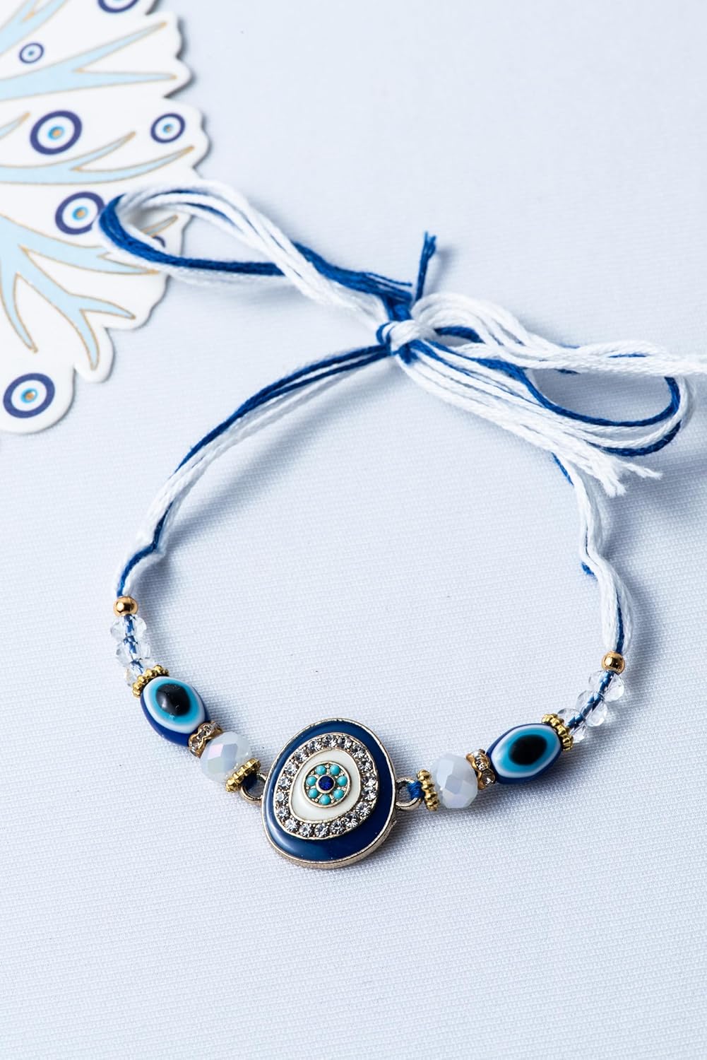 Handmade Evil Eye Rakhi for Bhai – Blue Beads & Crystal Thread for Raksha Bandhan - Image 4