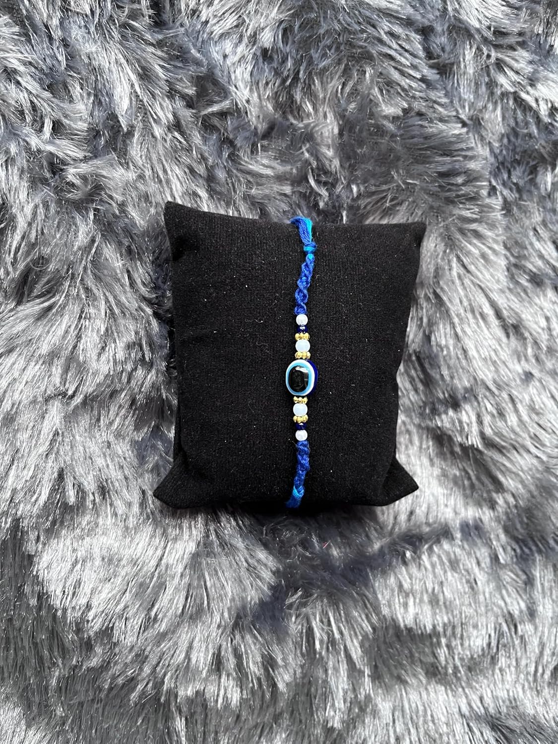 PDY FASHION Evil Eyes Handcrafted Blue Thread Rakhi with Pearl and Golden Beads, Traditional Indian Festival Bracelet - Image 6