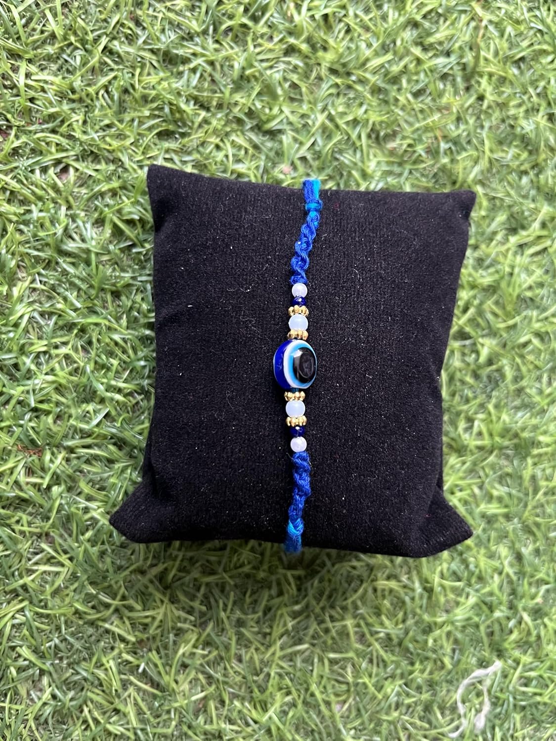 PDY FASHION Evil Eyes Handcrafted Blue Thread Rakhi with Pearl and Golden Beads, Traditional Indian Festival Bracelet - Image 4