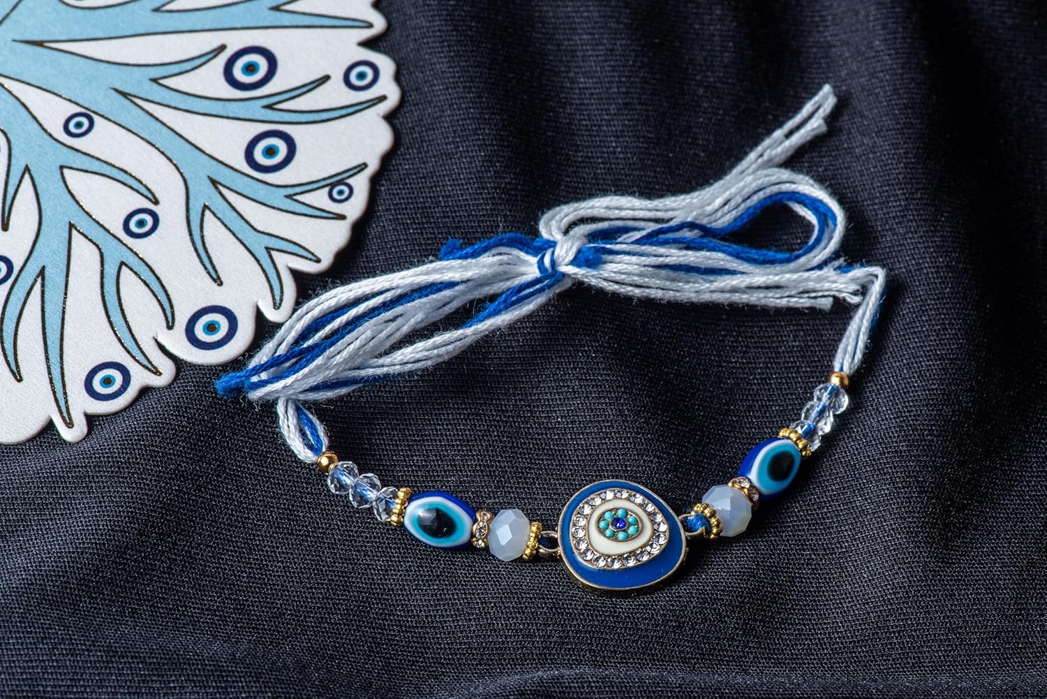 Handmade Evil Eye Rakhi for Bhai – Blue Beads & Crystal Thread for Raksha Bandhan - Image 3