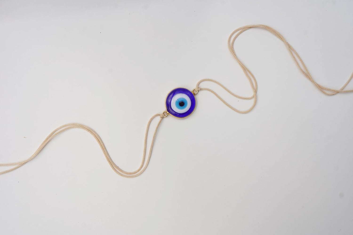 LOL STUDIO - LIVE OUT LOUD Evil Eye Rakhi with Blue Glass Pendant, Gold-Toned - Image 3