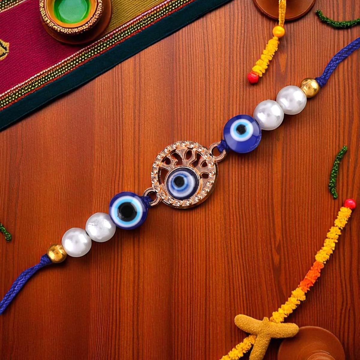 SHONA’S STYLE Evil Eye Charm Bracelet Rakhi with Crystal Rhinestones, Blue and Gold Beads, Thread Rakhi with roli chawal and cards - Image 4